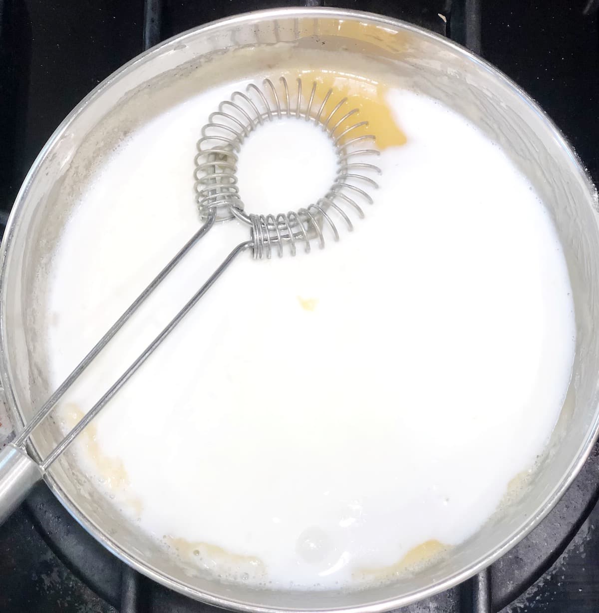 adding milk to besciamella roux