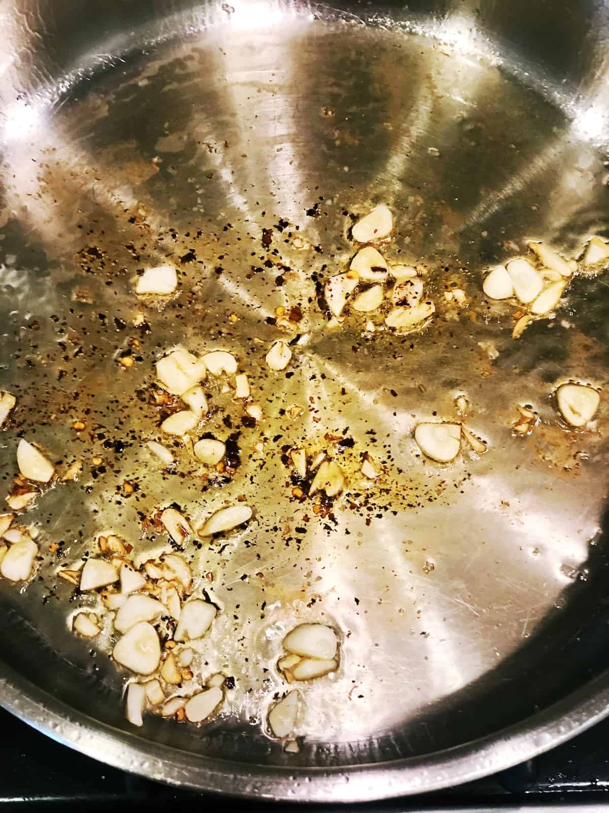 cooking garlic for shrimp bowl