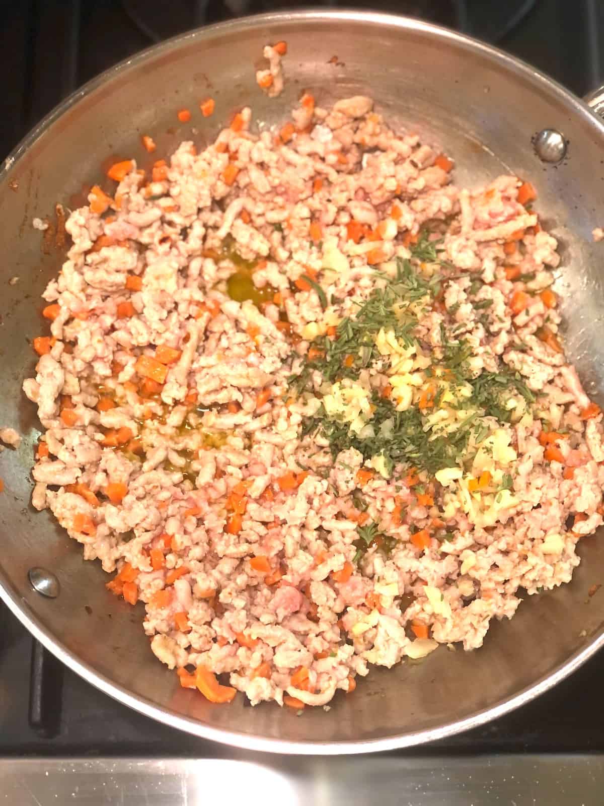 cooking ground pork in a pan