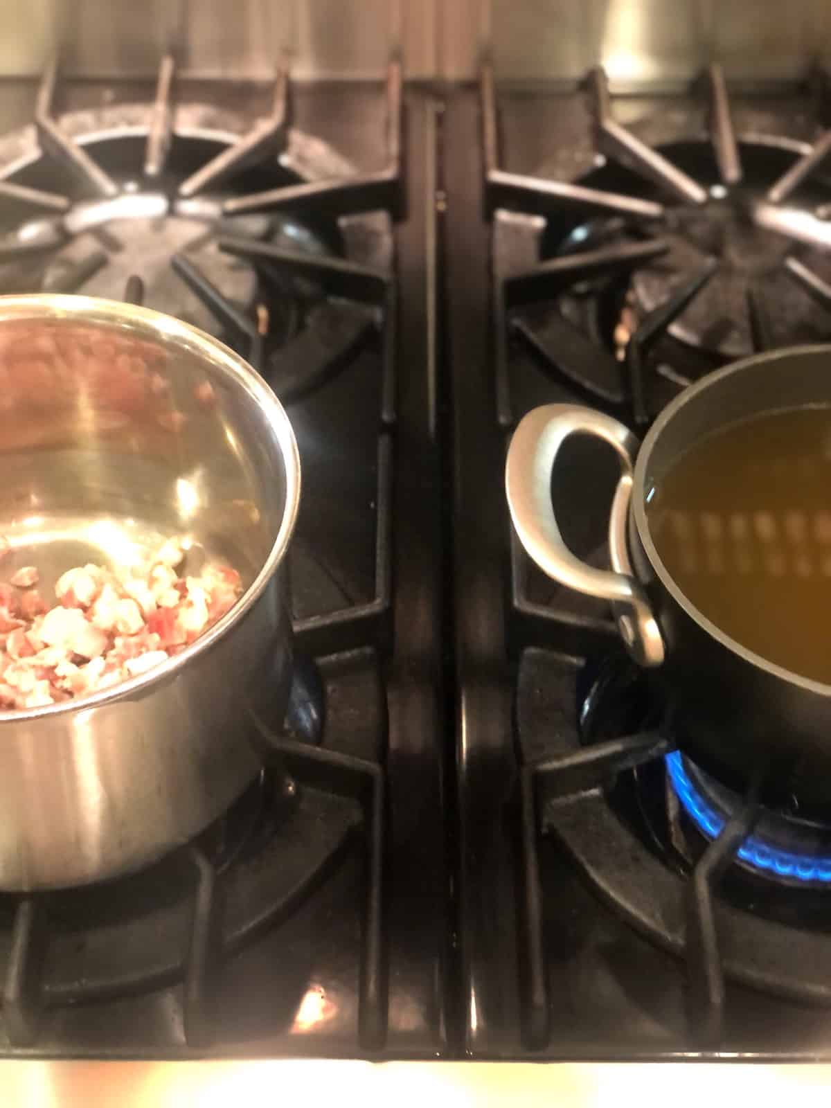 Two pots on the stovetop for cooking risotto