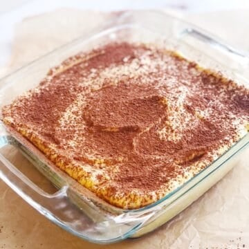 Amaretto tiramisu in a square pan.