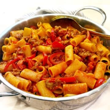 Sausage and peppers pasta in pan.