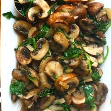 Cooked Italian mushrooms on a plate.