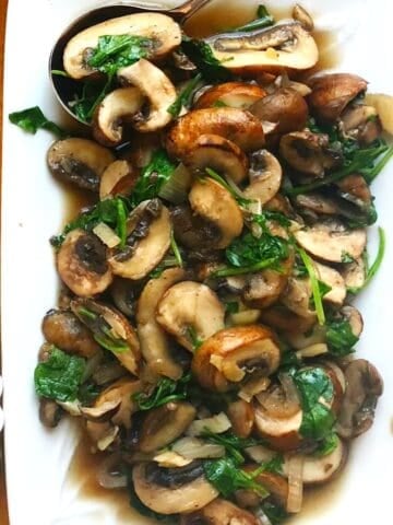 Cooked Italian mushrooms on a plate.