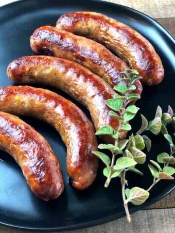 Cooked Italian sausage on a plate.