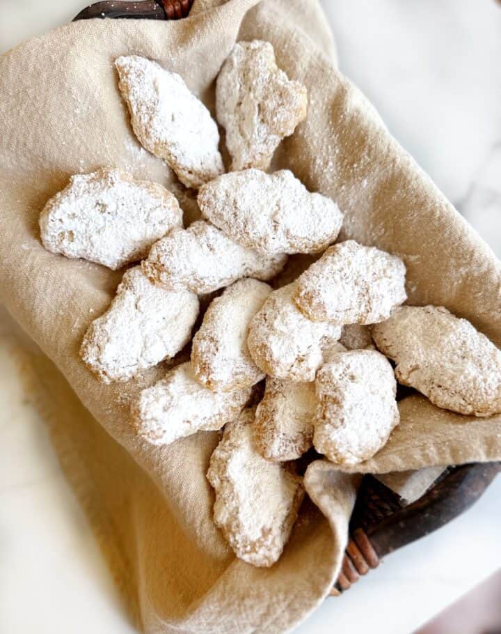 Chewy Italian almond cookies in a basket.