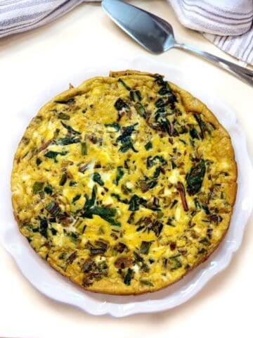 Swiss chard frittata on a plate.